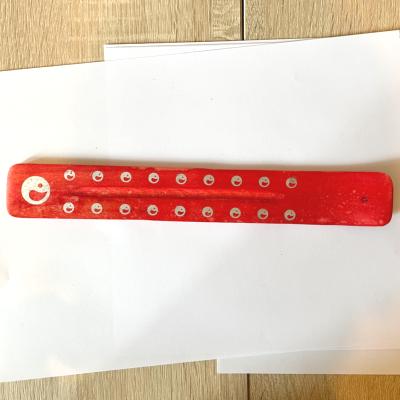 porte encen rouge